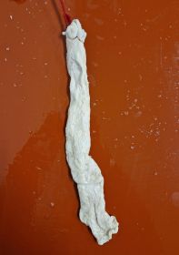 Fettenden 800g abgebunden mit roter Schlaufe 